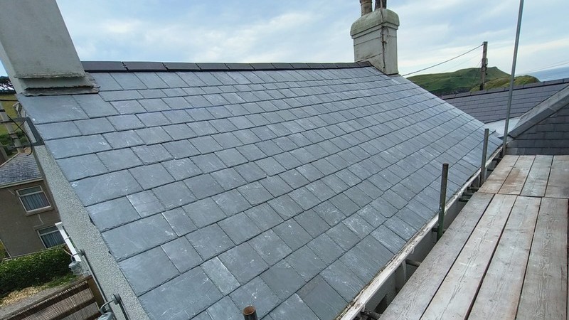 Roof Replacement and Spray Foam Insulation Removal on a Slate Tile Roof