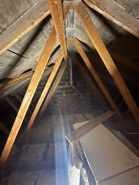 Loft roof structure with the spray foam removed