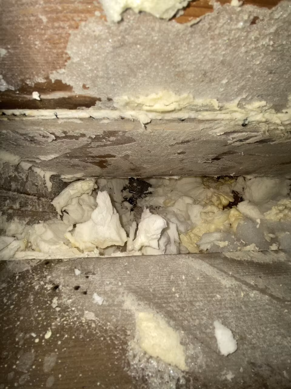 Spray foam residue remaining on the roof underlay